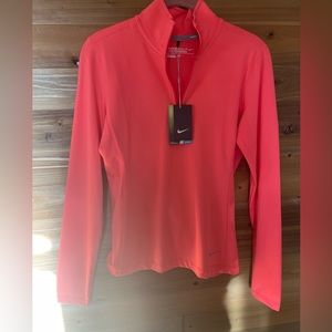 Nike golf shirt, made for the Dallas Cowboys. Size small, dri-fit, new with tags